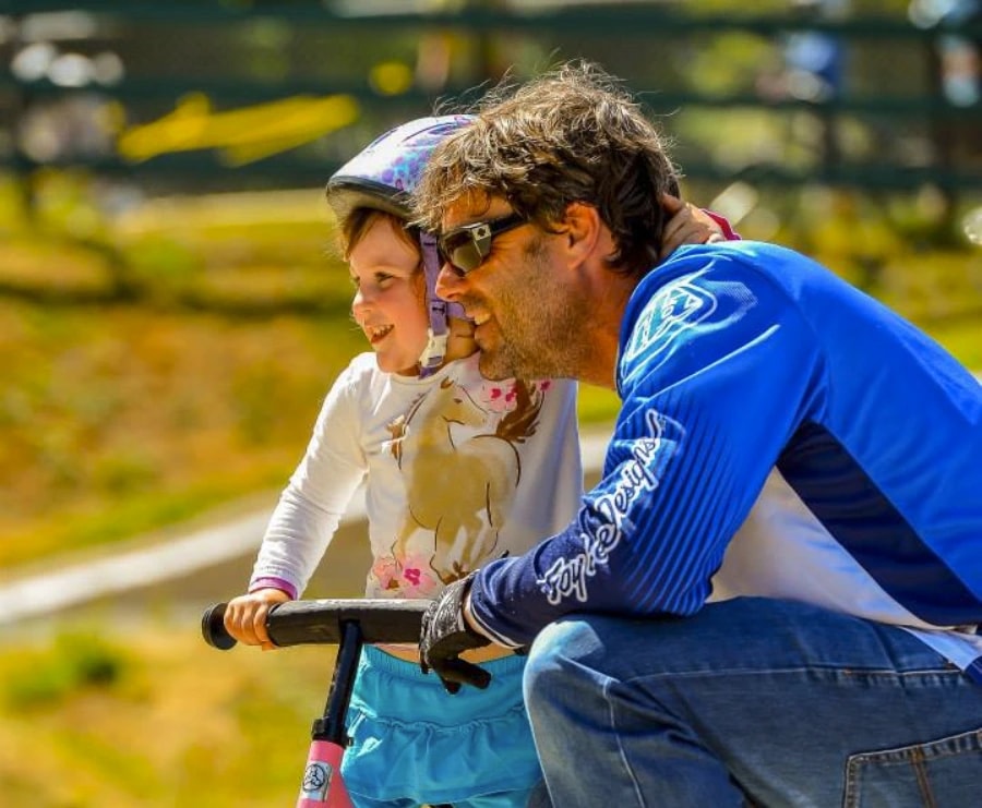 James Latham, owner-operator of Capital City Construction, with his young daughter